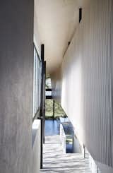 Hallway  Photo 9 of 12 in An Edgy Slatted Facade Conceals a Striking Indoor/Outdoor Home in Brisbane