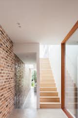 Wood Tread, Hallway, and Concrete Floor  Photo 5 of 9 in A Streamlined Addition Revives a Gloomy Victorian in Sydney