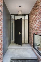 Doors, Exterior, Metal, and Swing Door Type  Photo 4 of 12 in A Progressive Melbourne Development Company Helps Facilitate an Exquisite Home Renovation