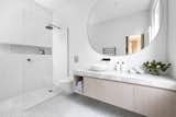 Bath Room, Marble Counter, Enclosed Shower, and Full Shower  Photos from A Progressive Melbourne Development Company Helps Facilitate an Exquisite Home Renovation
