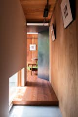 Medium Hardwood Floor, Windows, Metal, and Picture Window Type  Photos from Find Out How a Japanese Architect Created a Fluid Live/Work Space For a Photographer