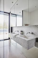 Bath Room, Marble Counter, Undermount Sink, and Marble Wall  Photos from A Sleek, Two-Story Addition Hides Behind a Traditional Cottage in Sydney