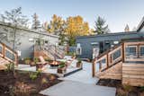 The&nbsp;prefab cabins&nbsp;on site were designed by Seattle–based architecture firm&nbsp;SHW, manufactured in Idaho, and installed by local contractors from&nbsp;Cascade Built.&nbsp;Here, a shared courtyard features a fire pit.