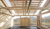 Garage, Storage, Attached Garage, and Sun Room The garage can also be used as a fitness/workout room, workshop and conservatory.  Garage Sun Room Photos from This Astounding Cabin in Norway Is a Patchwork of Different Materials