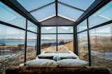 Panorama Glass Lodge bedroom with landscape views