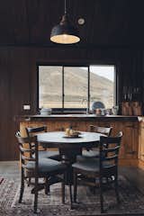 The interior walls are Ecoline V groove ply. "I chose to use a dark-colored stain inside, so that the walls almost disappear and you’re drawn through the windows to the outdoors," says Kenny.