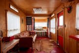 Living Room, Sofa, Rug Floor, and Console Tables Another peek inside a vintage trailer.

  Photo 8 of 12 in Let Your Creativity Soar at This Eclectic Hotel With Tents, Tepees, Yurts, and Trailers