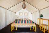Here is a look at one of the 21 safari tents. Each one is 120 square feet and comes with wooden floors and durable canvas walls/doors. 
