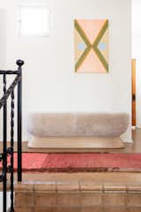 Cuffhome’s U Bench brings a textural pop to the top of the stairs.