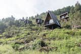 These Geometric Cabins in China Seem to Float Over a Hillside