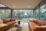 Views of the newly landscaped garden can be appreciated from two walls of glass in the living room.