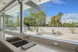 The kitchen overlooks the drought-tolerant landscaping in the yard.