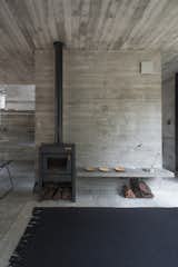The uninterrupted use of concrete throughout the interior creates a sense of fluidity between spaces.