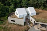 Nature Engulfs This South Korean  House Nestled Into the Earth