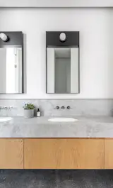 Blue de Savoie marble tops a custom vanity.