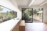A new sliding door offers a streamlined black frame for the view outside.