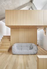 The mezzanine can be used as a guest space, art studio, or office.