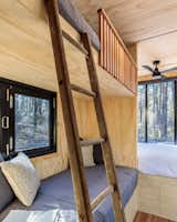 The lower bunk has its own window and can double as daytime lounge space.