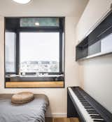 The window sill was deepened and extended to create room for a tea service. The piano has a permanent place in the home now.