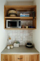 The pantry provides more storage and allows clutter or small appliances to be stashed away.