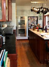 Before: Interior designer Stephanie Dyer of Dyer Studio was brought in to remodel this kitchen in a 1902 Victorian in Portland, Oregon. The brief was to create a more functional space that matched the scale and style of the original home. "I come from a historic preservation background and ethos," says Dyer, noting that a prior architect that the homeowners consulted suggested blowing out one side with an addition to get the space needed. "It's really important to me to not just come in with a sledgehammer and knock down everything."