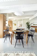 The dining table is a family heirloom surrounded by Ripley Dining Chairs from Four Hands.