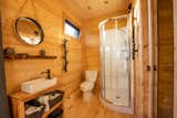 There are 1.5 bathrooms in the home, and the upstairs en-suite bath has the shower. "Although very well equipped with solar energy, you must manage energy according to the power of the sun," says Dignard. "In winter, taking six showers one after the other is not so much 'smart energy.'"