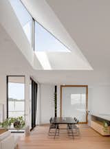 Located in Mount Martha in Victoria, Australia, the Three Angle House designed by&nbsp;Megowan Architectural features a&nbsp;dramatic, triangular skylight situated above the dining and living areas.