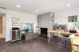 Each bedroom features floor-to-ceiling glass, and this one (set up as an office) has an original fireplace.