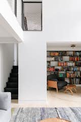 The firm removed that excess trim to create a simplified backdrop.