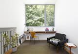A dedicated office nook with a built-in desk and lots of natural light thanks to the new window.