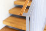 A detailed shot of the oak and metal railing.