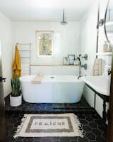The downstairs bathroom was also dramatically redone for a total of $18,121.