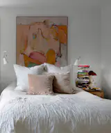 The couple kept their same bedroom, as they liked the light it got, and the Crepe Myrtle tree seen through the window.