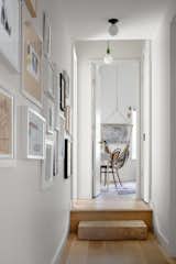 The step in the upstairs hall denotes where the old house ends and the new addition begins. "It’s really changed the way we live, that's for sure," says Catherine of their renovation. "It's just allowed a little bit more peace, because everyone is not on top of each other."