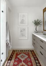 The boys’ former bedroom became a walk-in closet and en-suite bathroom, and the couple kept the worn oak flooring for the character. "I always say, I was over-sharing a bathroom with three guys," says Catherine.