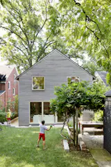 The couple wanted to make sure there was still room for the kids to play in the backyard, so a portion of the lawn was kept.