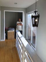 Before: Previously, there was a sliding glass door to the third-floor deck at the top of the stairs. Positioned as it was, the best viewpoint in the house had no relationship to the living spaces.