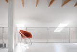 The loft railing is expanded metal mesh, and the floor is white-painted fin ply.