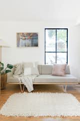 The Case Study Furniture Bentwood Daybed Couch from Modernica was placed with a Shop Territory rug. The linens are by Cultiver and The Citizenry, and the photograph is by Morgan Pansing.