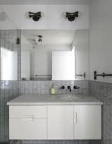 Kaplan redid the bathroom to be in the same style as the main suite, then created two bedrooms and a study, made possible by the rear extension’s added space.