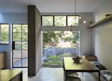 The picture window drops to the floor, so as to make the connection between inside and out more fluid. Kaplan divided the backyard into two sections, with the portion against the window imagined as a “quiet, Zen garden made of sedum,” says the architect.