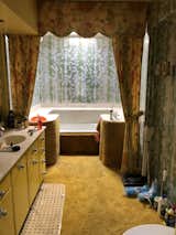 Before: The team rearranged the floorplan so that this bathroom, formerly part of the main suite, became an en-suite for a different bedroom.