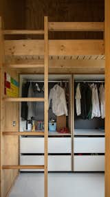 To save space, each child’s room has a mezzanine bed with the closet tucked underneath.