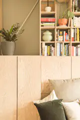 Either open corner has a neon light, each a different color, that washes the surrounding wood to create a “light box,” says Ren.