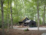 When the trees leaf out, the overhauled guest cabin, the couple’s “Scandinavian dream cabin in the woods,” is hidden from view from the main house, making for a private retreat.