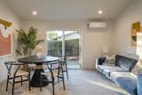 The Modus team gave it more of a studio feel, with bigger living areas connected to the backyard, and a bedroom and bathroom. The blue velvet sofa is a Francesca Grace custom design, placed with a Rishi Black Rope Round Table from TOV and chairs from Poly and Bark.