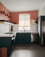 The custom Fenix cabinets have a matte finish and Schoolhouse hardware, and the counters are quartz.