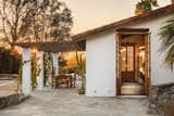 With the new doors and cleared exterior area, the guest house connects better to the main backyard area and pool.