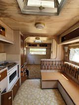 Before: The couple exchanged all the brown-toned finishes for a white and mint palette.